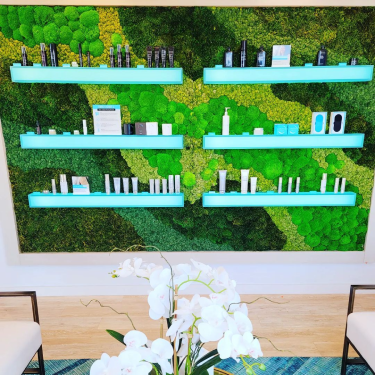 WOODHOUSE SPA - 375x375 Woodhouse Spa interior wall with product